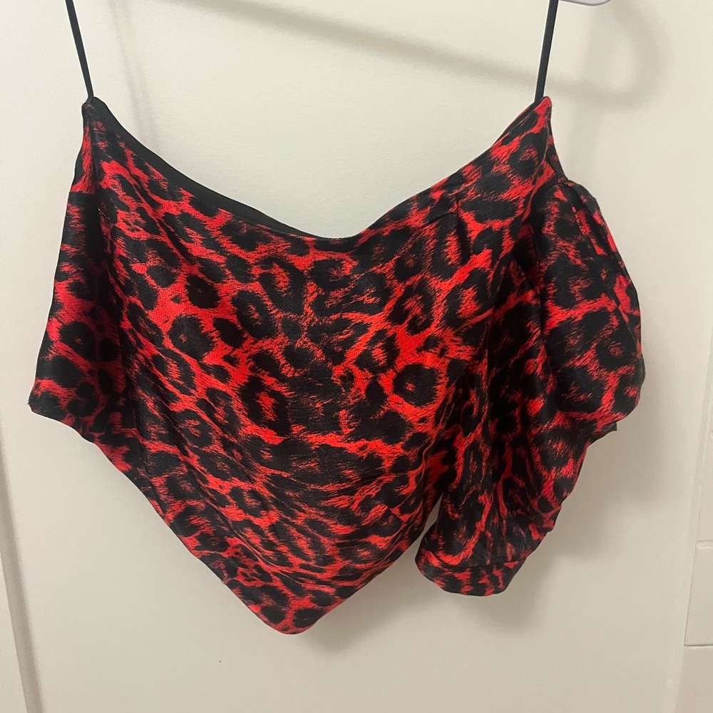Bec and Bridge one shoulder blouse with side zipper. Inside lining torn.